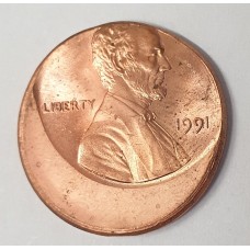 UNITED STATES OF AMERICA 1991 . ONE 1 CENT COIN . ERROR . 25% OFF CENTRE MIS-STRIKE